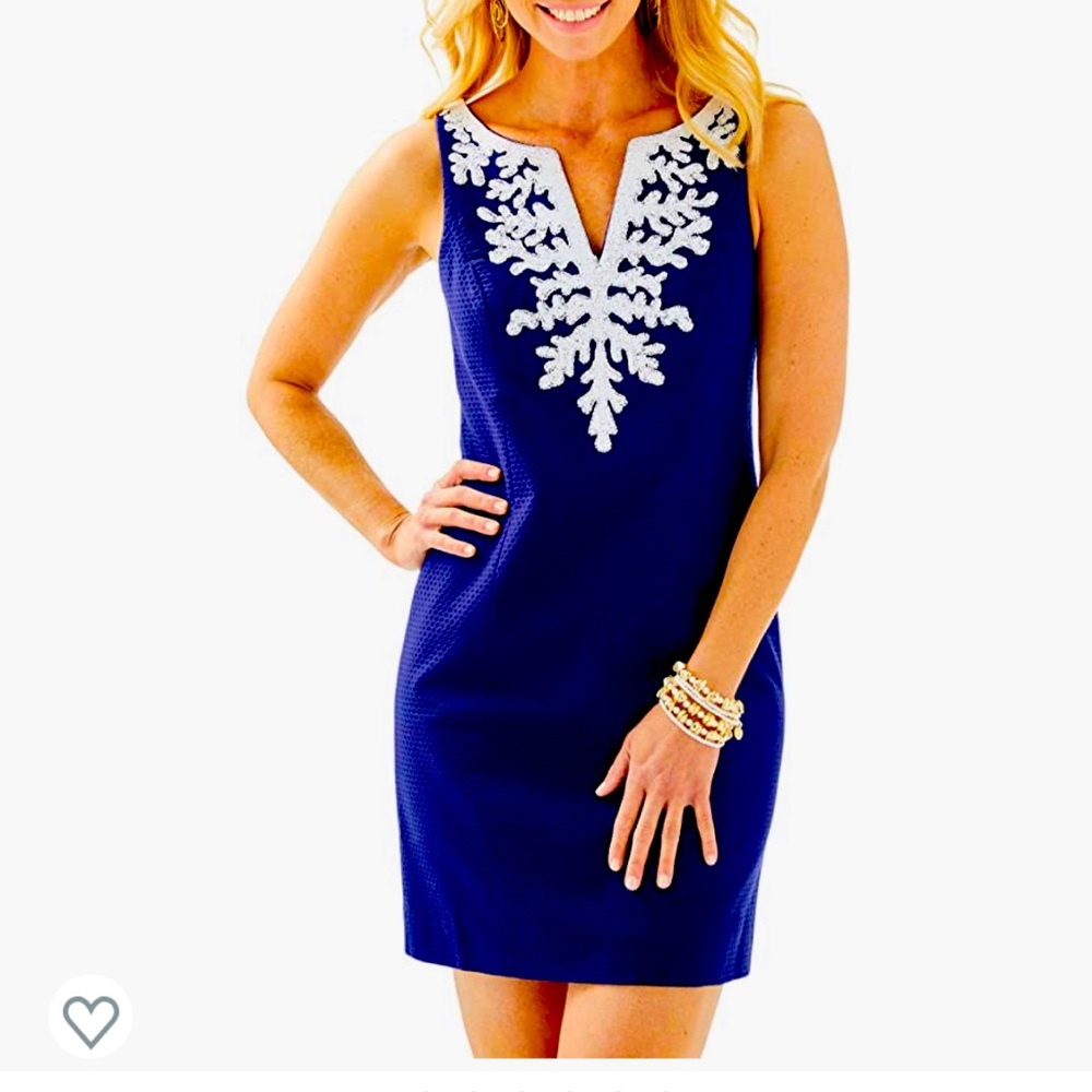 Beautiful navy blue Lily with white beaded detailing.